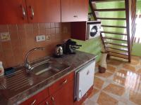Kuchyňa alebo kuchynka v ubytovaní Nefelejcs Apartman