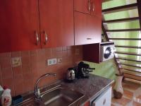 Kuchyňa alebo kuchynka v ubytovaní Nefelejcs Apartman