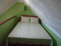 Posteľ alebo postele v izbe v ubytovaní Nefelejcs Apartman