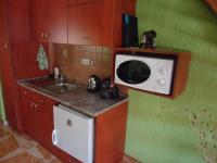 Kuchyňa alebo kuchynka v ubytovaní Nefelejcs Apartman
