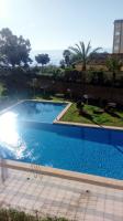 Bazén v ubytovaní Spacious apartment in Calpe of 100 m² with shared pool! alebo v jeho blízkosti
