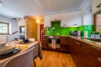 Kuchyňa alebo kuchynka v ubytovaní Apartamenty Tatrzańskie Turnie