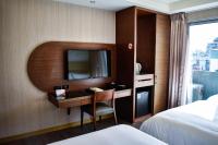 Talmud Hotel Tainanにあるベッド