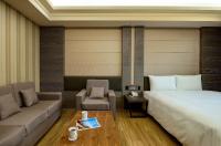 Talmud Hotel Tainanにあるベッド