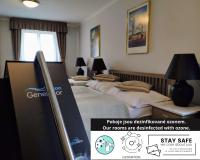 Postel nebo postele na pokoji v ubytování Hotel Salvator