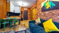 Posedenie v ubytovaní Apartament Biały Wilk - 5D Apartamenty