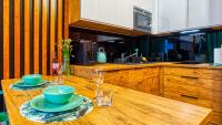 Kuchyňa alebo kuchynka v ubytovaní Apartament Biały Wilk - 5D Apartamenty