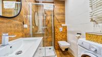 Kúpeľňa v ubytovaní Apartament Biały Wilk - 5D Apartamenty