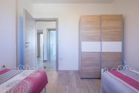 Postel nebo postele na pokoji v ubytování Kaylie Apartment