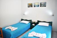 Posteľ alebo postele v izbe v ubytovaní Kuris Studios & Apartments