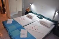 Posteľ alebo postele v izbe v ubytovaní Kuris Studios & Apartments
