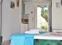 Posteľ alebo postele v izbe v ubytovaní Kuris Studios & Apartments