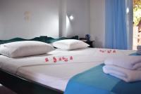 Posteľ alebo postele v izbe v ubytovaní Kuris Studios & Apartments