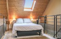 a bedroom with a bed and a skylight at Beautiful Home In La Meauffe With 2 Bedrooms And Wifi in La Meauffe