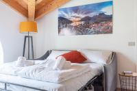A bed or beds in a room at Casa Joanna