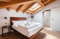 A bed or beds in a room at Casa Joanna
