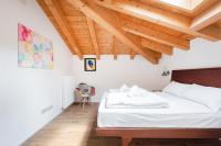 A bed or beds in a room at Casa Joanna