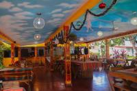 En restaurant eller et andet spisested på Hotel y Restaurante Rincón Familiar