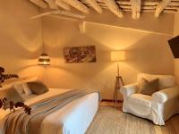 Postel nebo postele na pokoji v ubytování Hotel Masia La Palma
