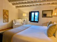 Postel nebo postele na pokoji v ubytování Hotel Masia La Palma