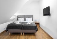 Postel nebo postele na pokoji v ubytování Apartamenty, Boutique Rooms Villa 82, MIEJSCE PRKINGOWE