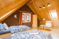 Postel nebo postele na pokoji v ubytování Vinný apartmán Rakovník