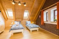 Postel nebo postele na pokoji v ubytování Vinný apartmán Rakovník