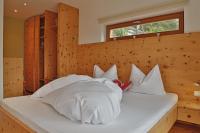 Postel nebo postele na pokoji v ubytování chalet naturel