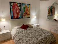 A bed or beds in a room at Casa Sauro