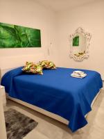 A bed or beds in a room at Casa Sauro