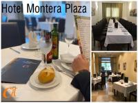 a table in a restaurant with a plate of food at Hotel Montera Plaza in Los Barrios