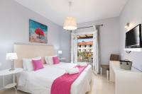 Posteľ alebo postele v izbe v ubytovaní Garden Apartments Agios Stefanos Corfu