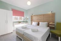 Posteľ alebo postele v izbe v ubytovaní Garden Apartments Agios Stefanos Corfu