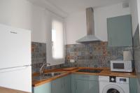 Kuchyňa alebo kuchynka v ubytovaní Apartamentos Cala San Pedro
