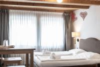 Posteľ alebo postele v izbe v ubytovaní Stay COOPER l Goethe Guesthouse
