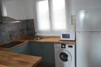 Kuchyňa alebo kuchynka v ubytovaní Apartamentos Cala San Pedro