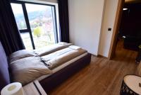 Posteľ alebo postele v izbe v ubytovaní Apartamenty Minimal House