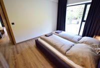 Posteľ alebo postele v izbe v ubytovaní Apartamenty Minimal House