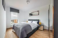 Posteľ alebo postele v izbe v ubytovaní Apartamenty Sun & Snow Spektrum