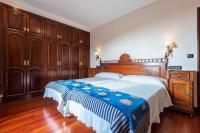 Postel nebo postele na pokoji v ubytování Hotel - Casa de Turismo Rural Dugium
