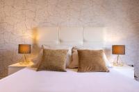 Posteľ alebo postele v izbe v ubytovaní Exclusive Apartments Plaza Merced
