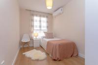Posteľ alebo postele v izbe v ubytovaní Exclusive Apartments Plaza Merced