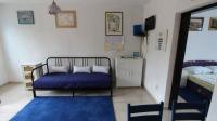 Postel nebo postele na pokoji v ubytování Apartments Lastavica