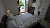 Postel nebo postele na pokoji v ubytování Apartments Lastavica