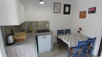 Kuchyň nebo kuchyňský kout v ubytování Apartments Lastavica