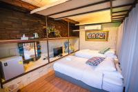 Postel nebo postele na pokoji v ubytování Suankaew​ art​ hostel​