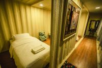 Postel nebo postele na pokoji v ubytování Suankaew​ art​ hostel​
