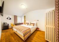 Postel nebo postele na pokoji v ubytování Bellevue Hotel Benešov