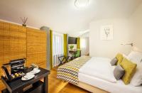 Postel nebo postele na pokoji v ubytování Bellevue Hotel Benešov