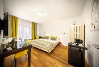 Postel nebo postele na pokoji v ubytování Bellevue Hotel Benešov
